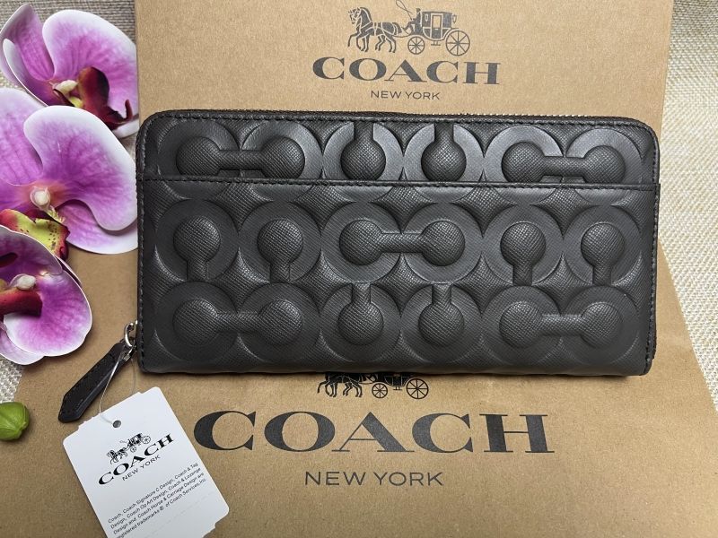 COACHコーチ長財布シグネチャー エンボス 立体ラウンドファスナー - 小物