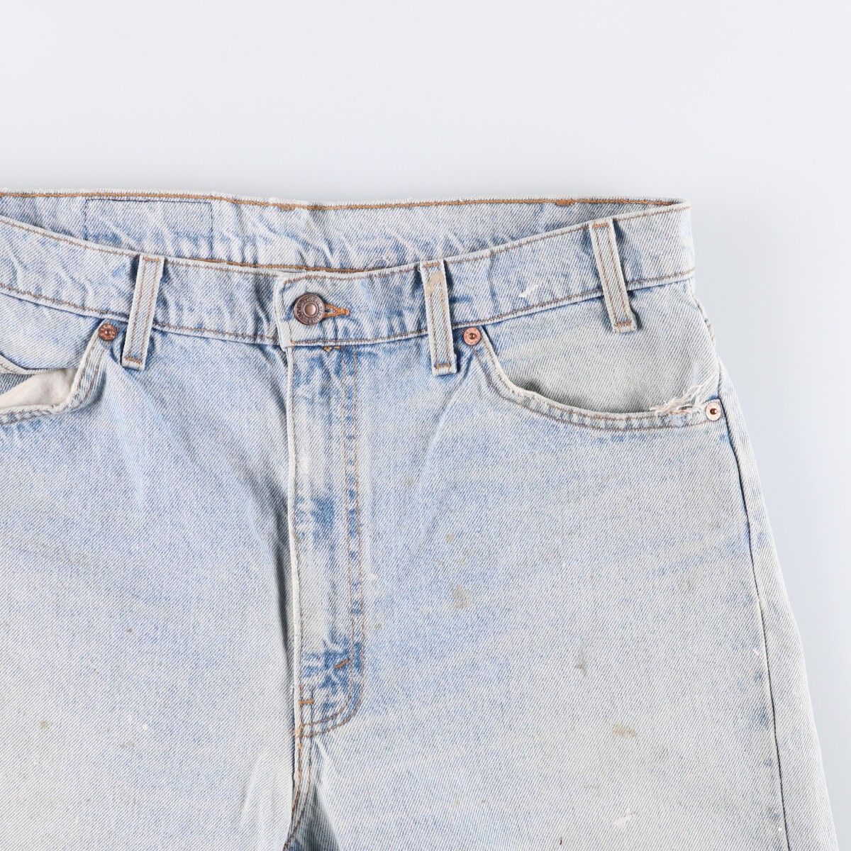 オレンジタブ テーパードデニムパンツ