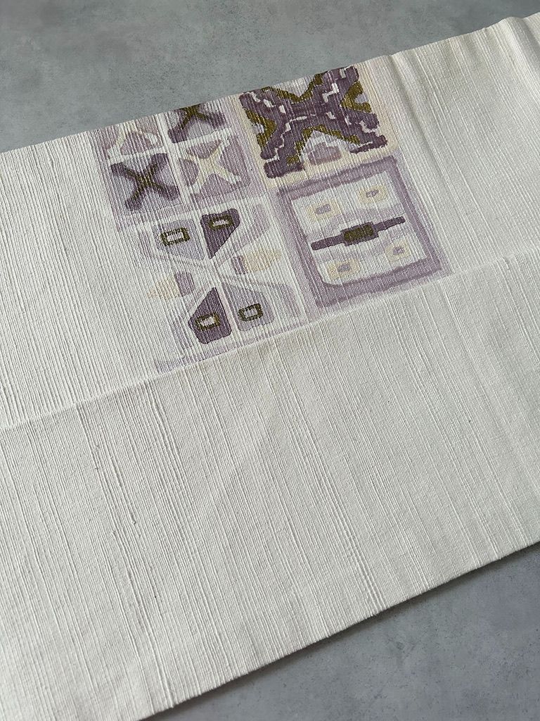 白地に薄紫の幾何学模様 紬の名古屋帯