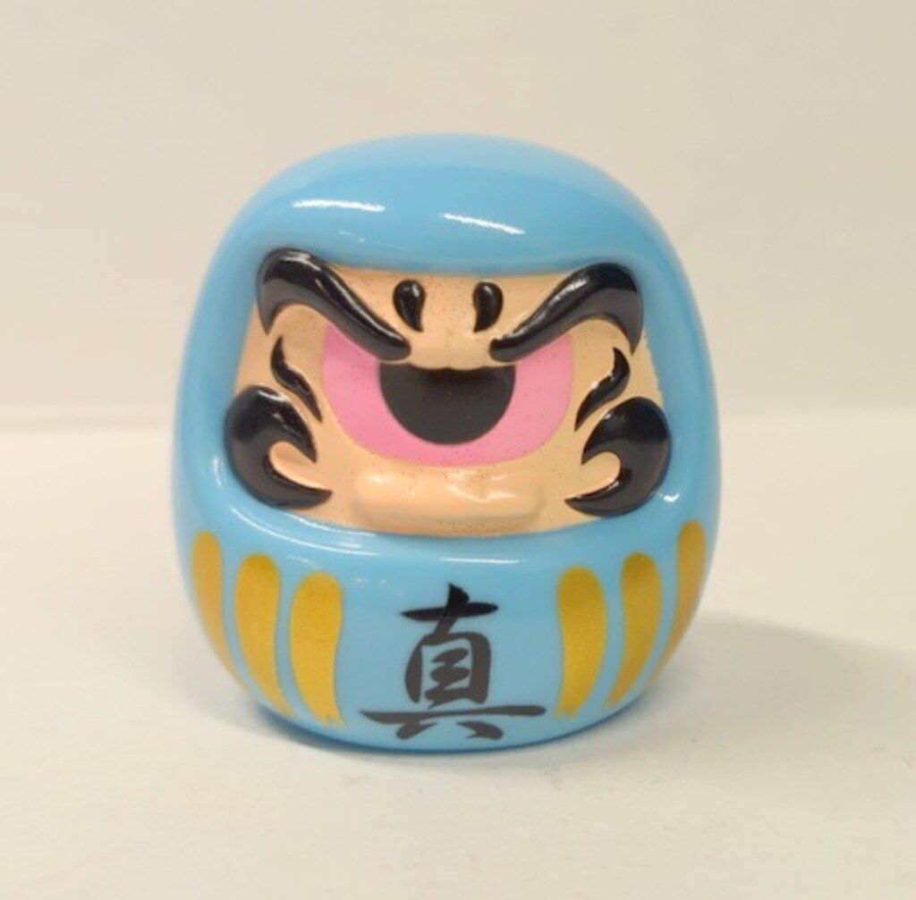 REALHEAD フォーチュンだるま(水色成型/顔肌色/黒ピンク目