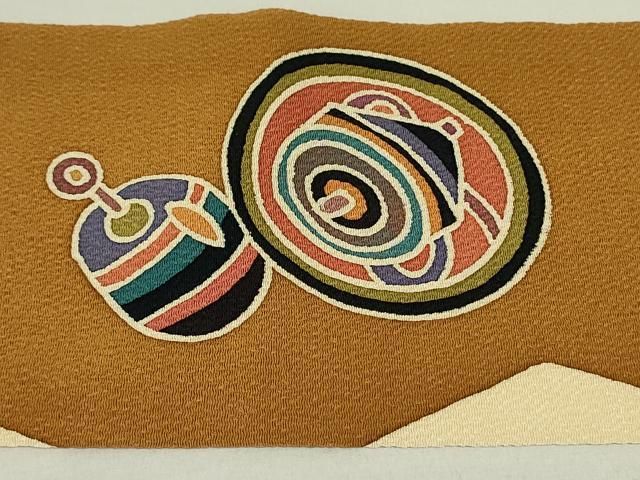 平和屋着物○九寸名古屋帯 作家物 型染 玩具文 独楽 コマ 鬼しぼ縮緬