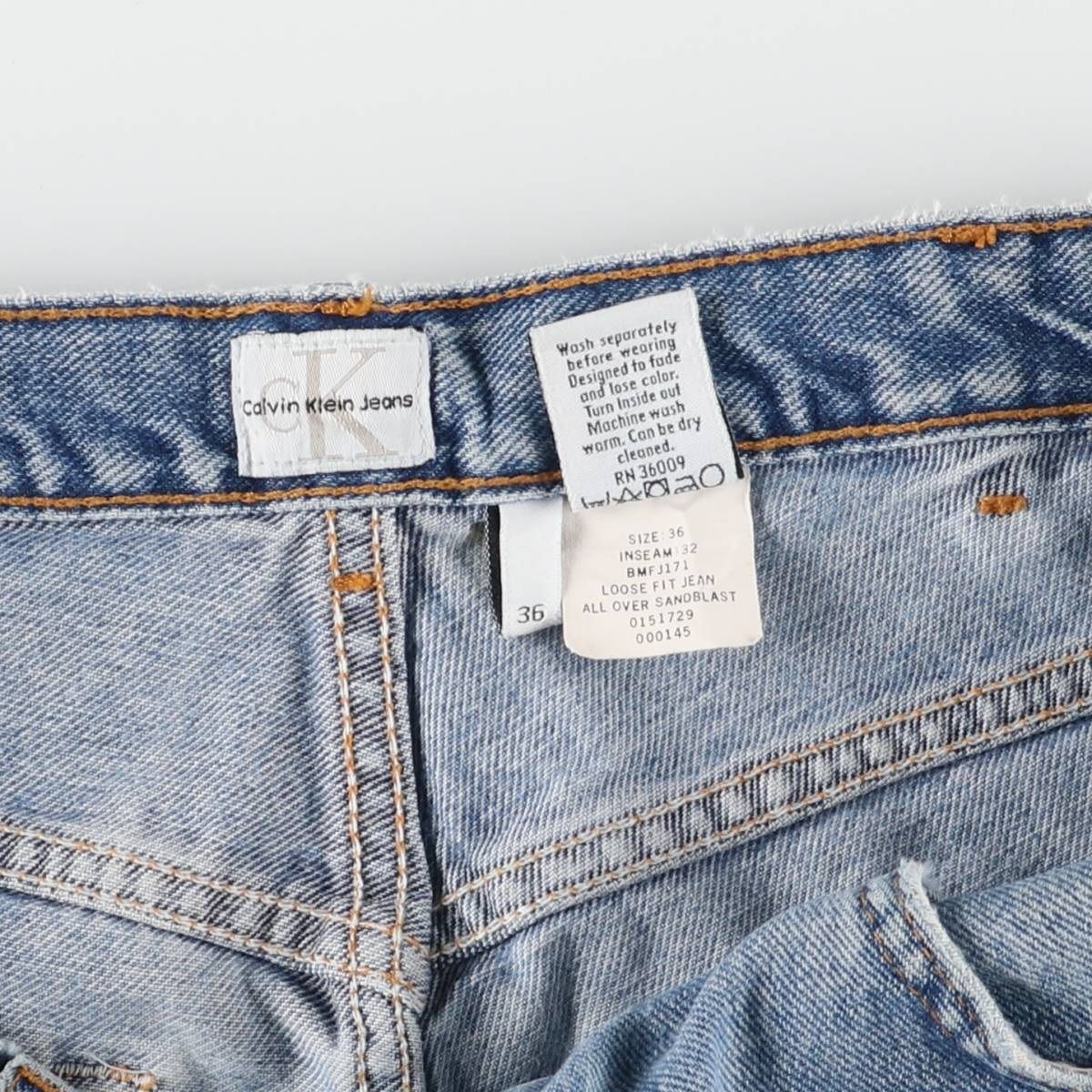 JEANS テーパードデニムパンツ