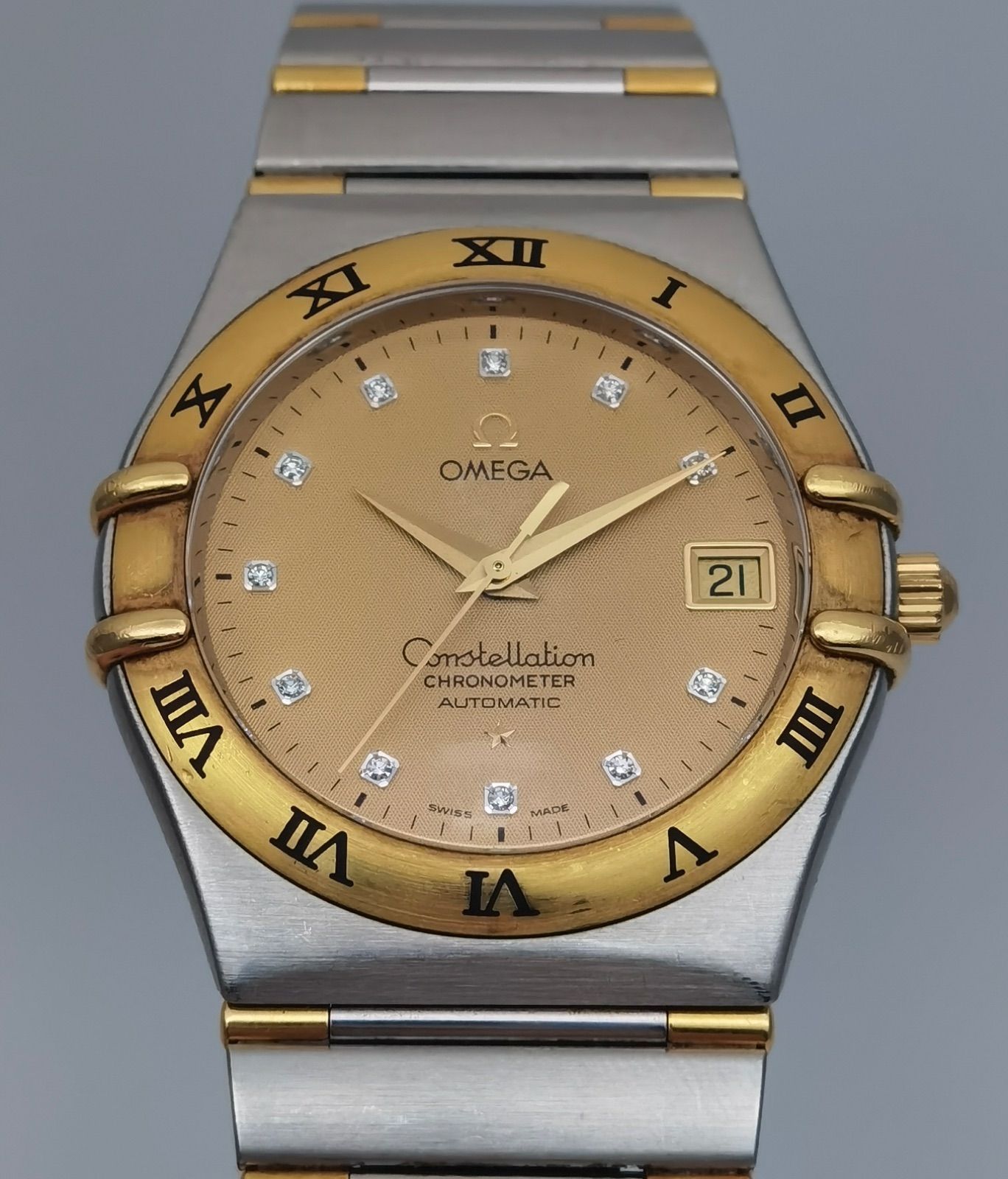 保証書付き オメガ OMEGA コンステレーション 1302.15.00 デイト 11Pダイヤモンド SS YG イエロー文字盤 メンズ 自動巻き 腕時計
