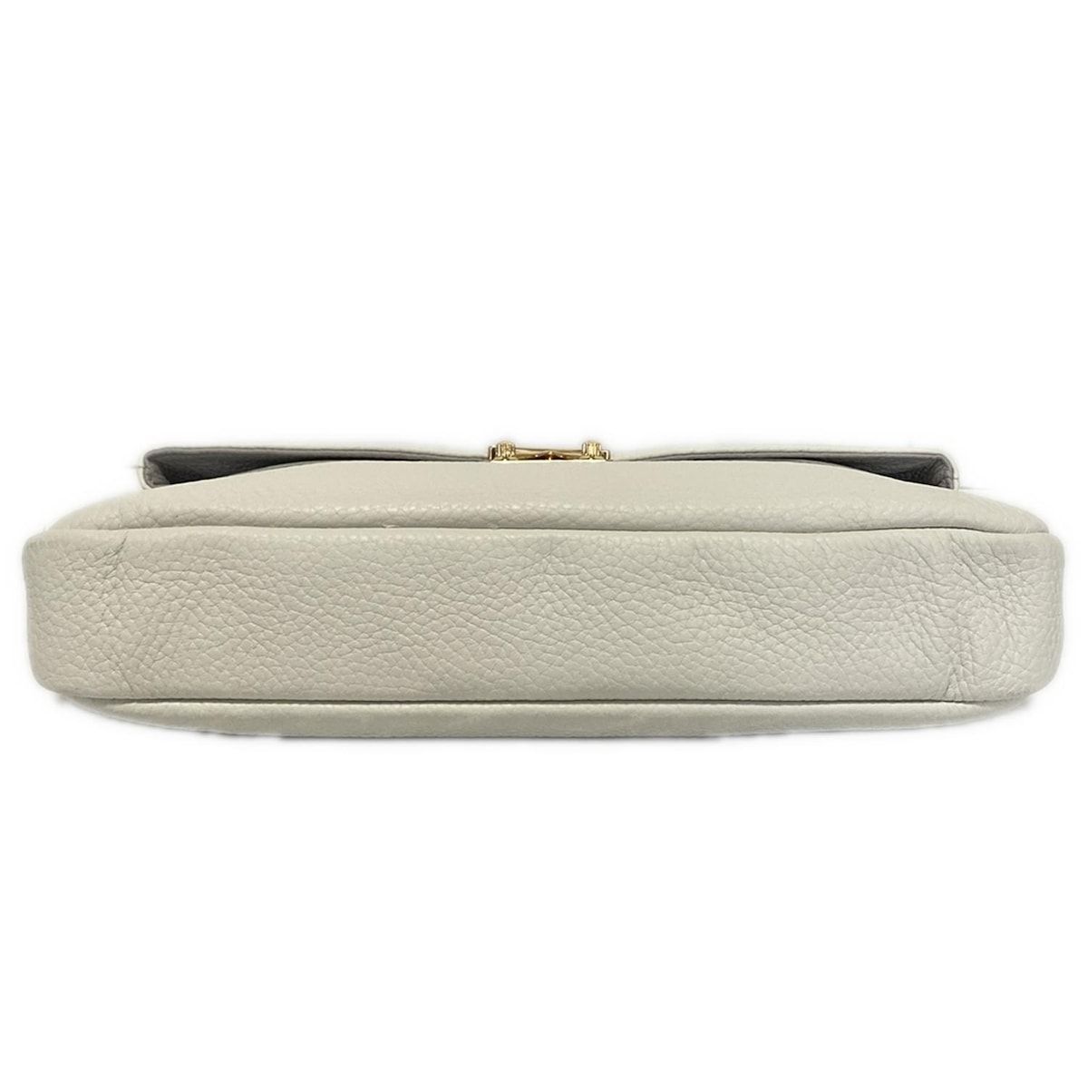 ココセリュックスゴールド クラッチバッグ