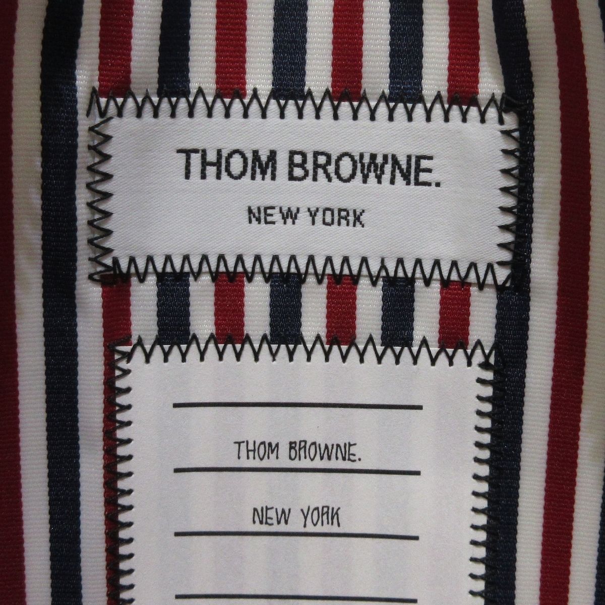 THOM BROWNE(トムブラウン) クラッチバッグ美品  ダークグレー×白×マルチ テニスラケット レザー