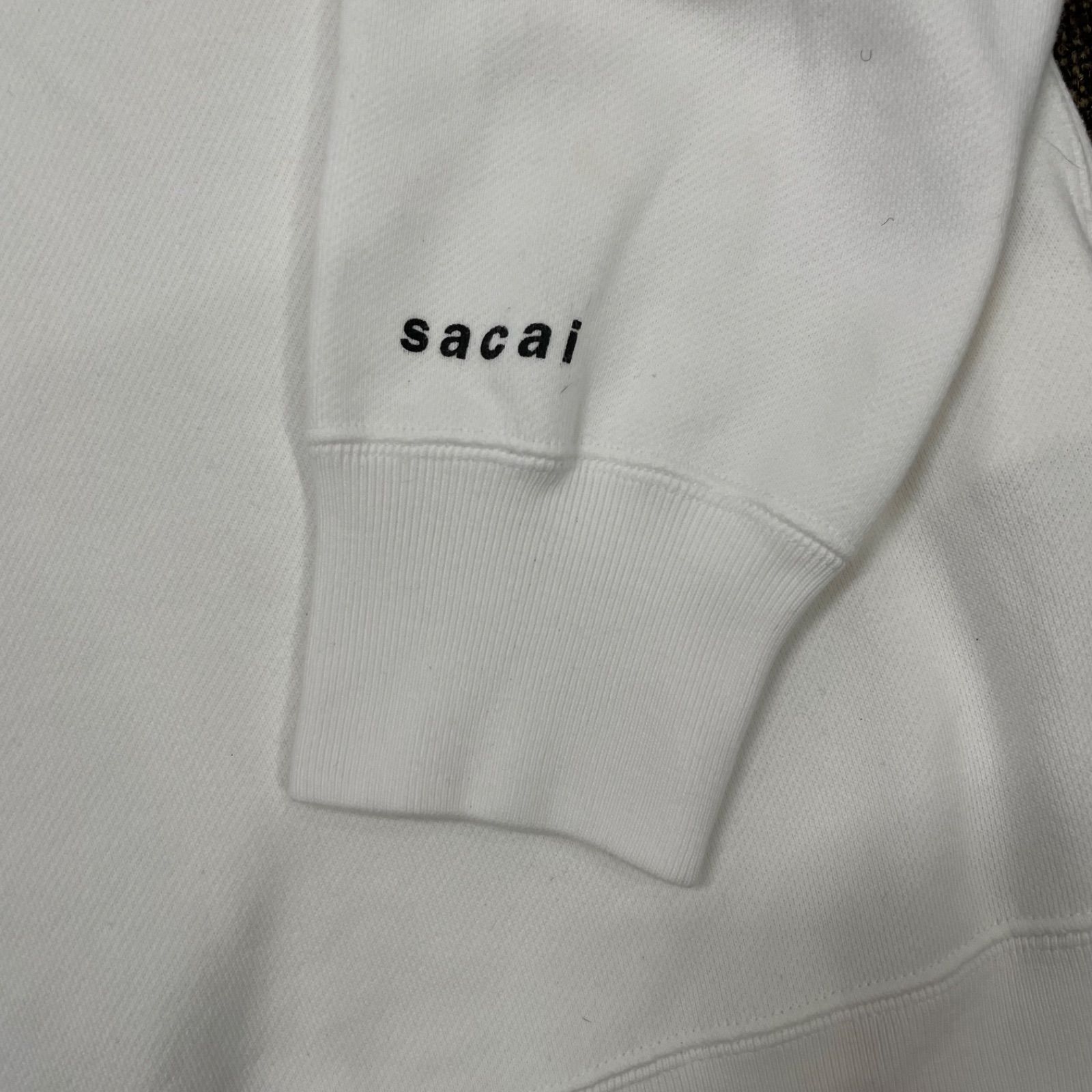 パーカー(i)SACAI × KAWS サカイ×カウズ フロッキー ロゴ プリント 