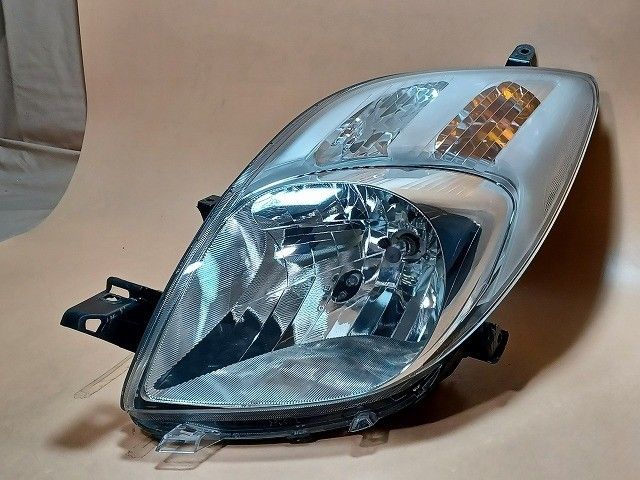 コーティング済 ヴィッツ NCP95 左ヘッドランプ ヘッドライト F 4WD イチコ 52-169 81150-52580 3P3