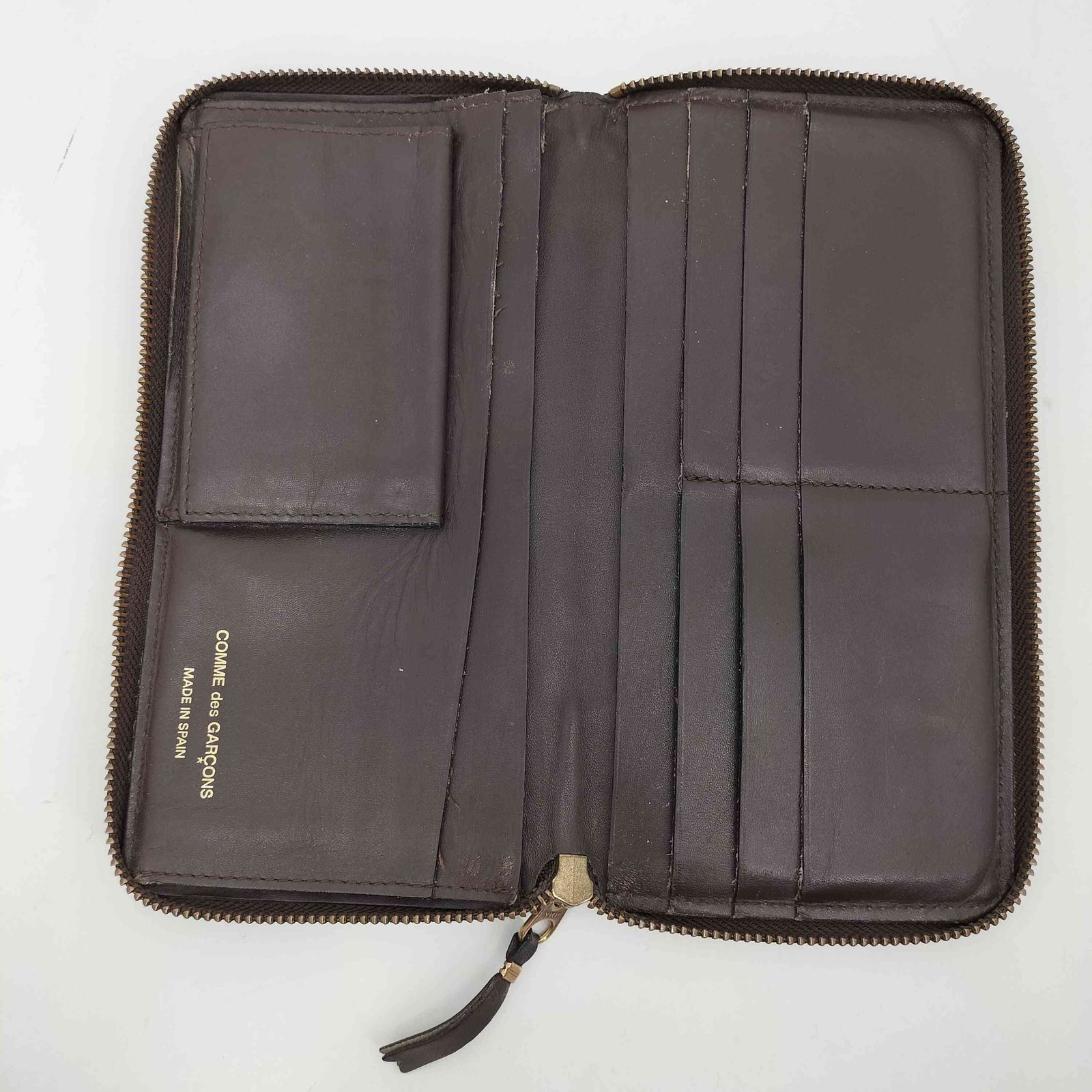 COMME des GARCONS(コムデギャルソン) ロゴ型押し ラウンドファスナー ウォレット 長財布 メンズ 表記無 【中古】【ブランド古着バズストア】 コムデギャルソン COMME des GARCONS ロゴ型押し ラウンドファスナー