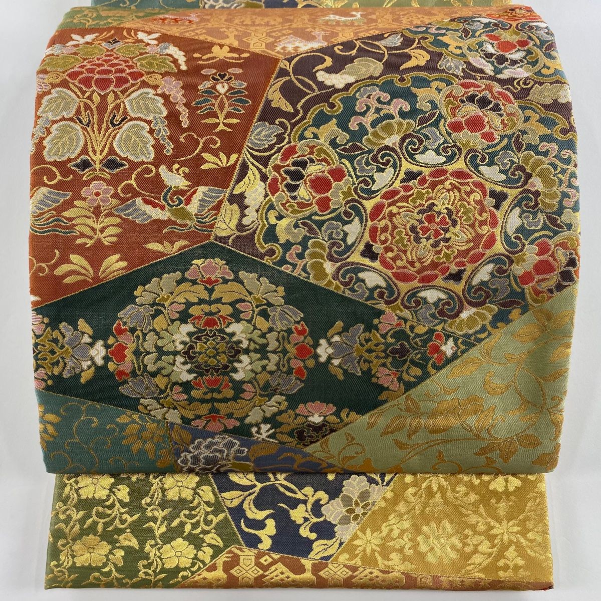 袋帯 秀品 華文 草花 箔 深緑 六通 正絹