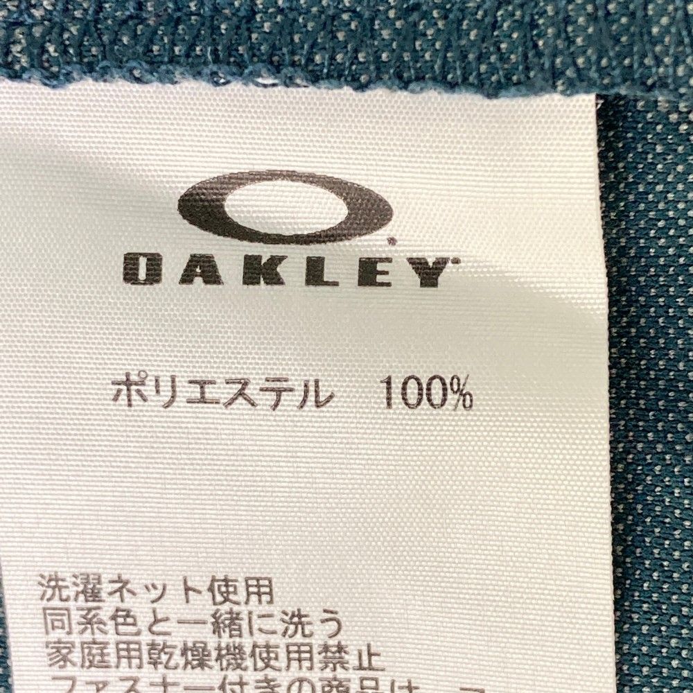 サイズ：XL OAKLEY オークリー FOA400844 半袖ポロシャツ ボタンダウン 総柄 ネイビー系 [240101472868] ゴルフウェア メンズ ストスト サイズ：XL OAKLEY オークリー FOA400844 半袖ポロシャツ ボタン
