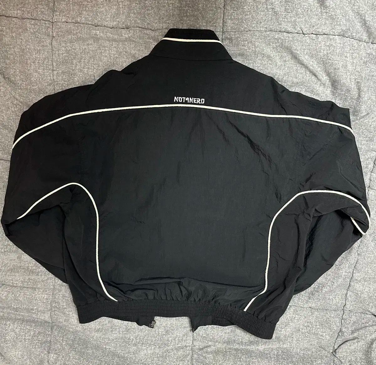 NOT4NERD(ノットフォーナード) Tribal Logo Nylon Racing Jacket