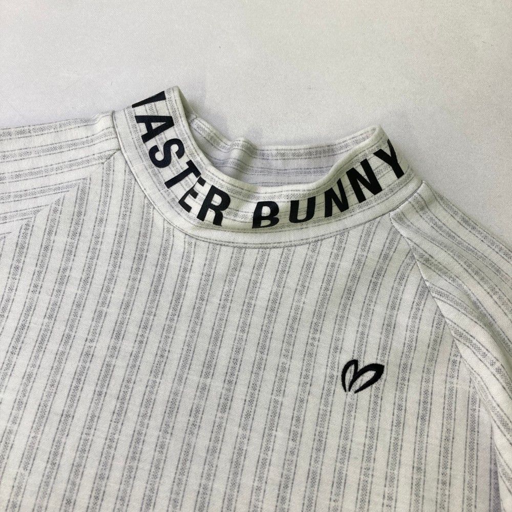サイズ：0 MASTER BUNNY EDITION マスターバニーエディション  ハイネック 長袖 Tシャツ ストライプ柄 ブラック系 [240101436260] ゴルフウェア レディース ストスト サイズ：0 MASTER BUNNY EDITION マスターバニーエディション