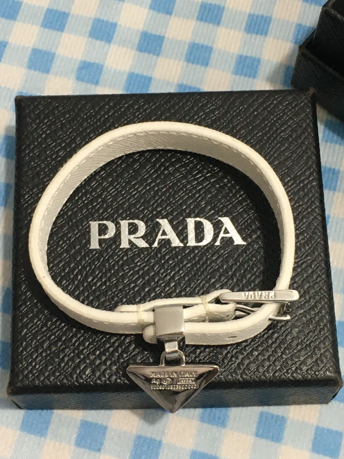 PRADA プラダ サフィアーノレザー ブレスレット ユニセックス 男女兼用 三角ロゴ ホワイト シルバー金具