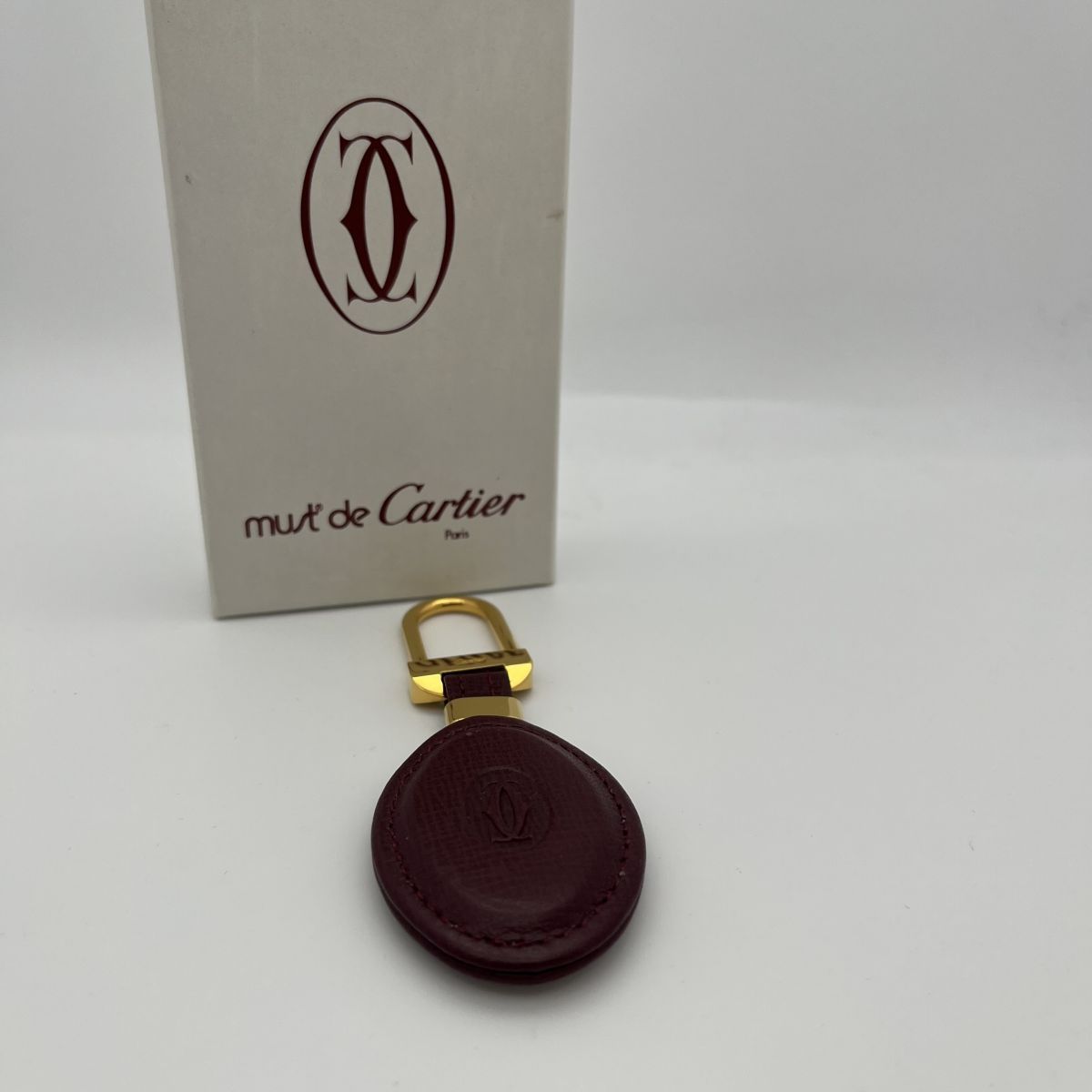 美品 箱付 カルティエ キーリング ゴールド×赤系 YSD - メルカリ