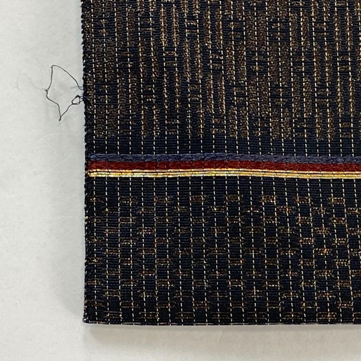 袋帯 秀品 幾何学模様 金糸 箔 墨色 お太鼓柄 正絹 【中古