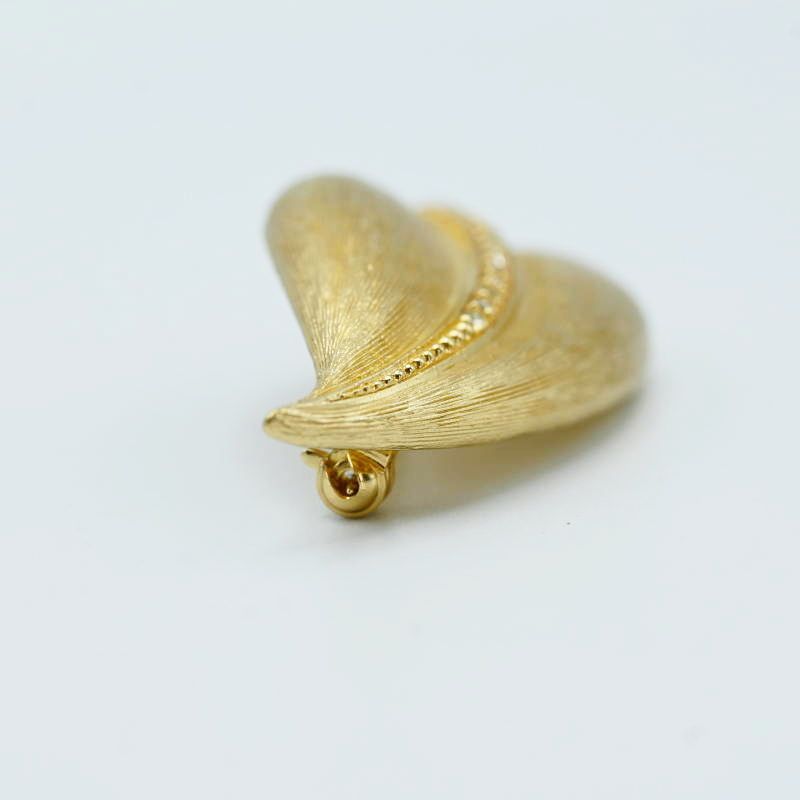 Christian Diorラインストーン リーフ ピンブローチ