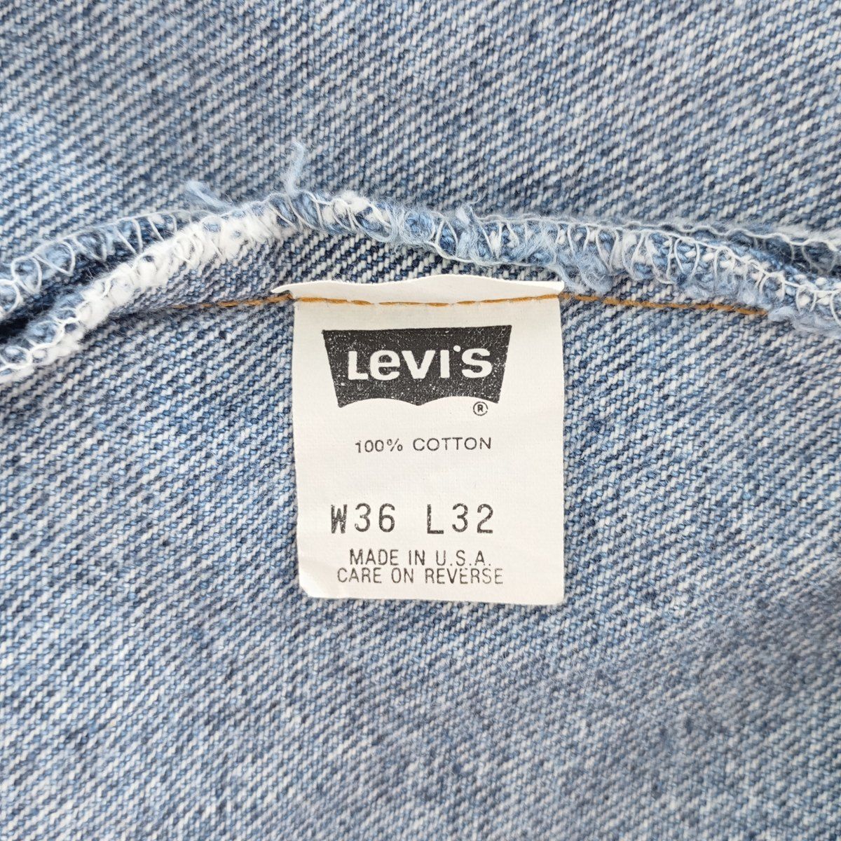 550 テーパードデニムパンツ