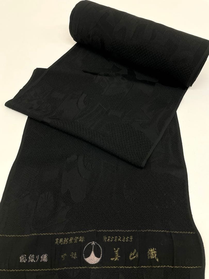 ロングコート地 ふくれ織 紋意匠 黒色 正絹 反物 - メルカリ