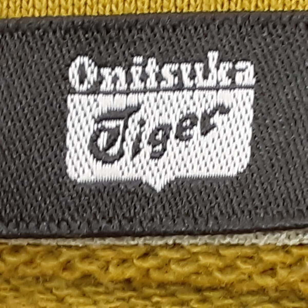 asics Onitsuka Tiger(アシックス・オニツカタイガー) パーカー サイズM メンズ美品  - イエローグリーン 長袖/ジップアップ