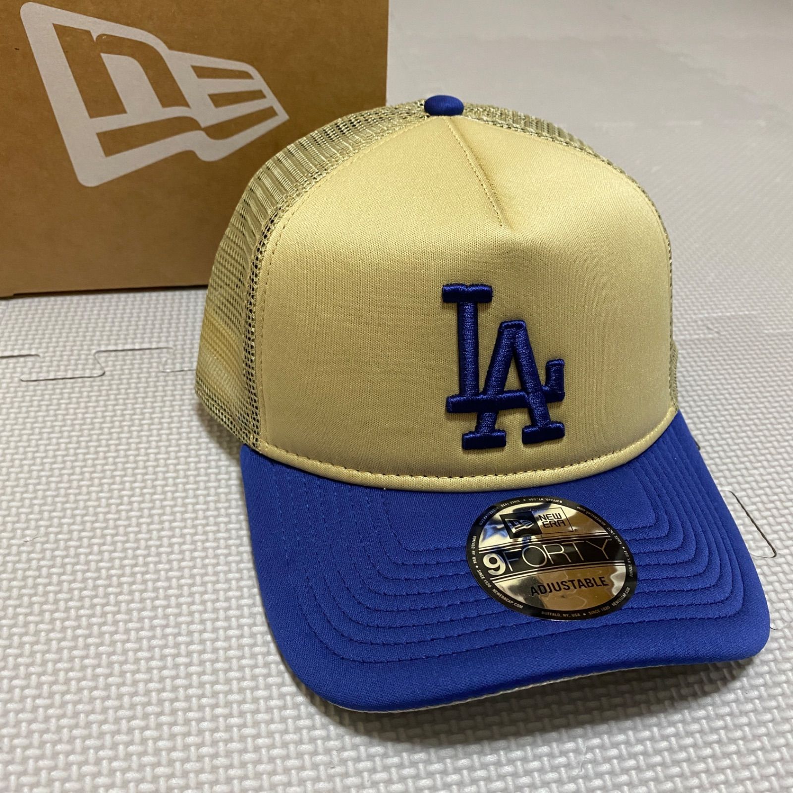 《NEWERA》ニューエラ ロサンゼルス ドジャース スナップバック トラッカー キャップ ベガスゴールド ブルー つば裏 グレー