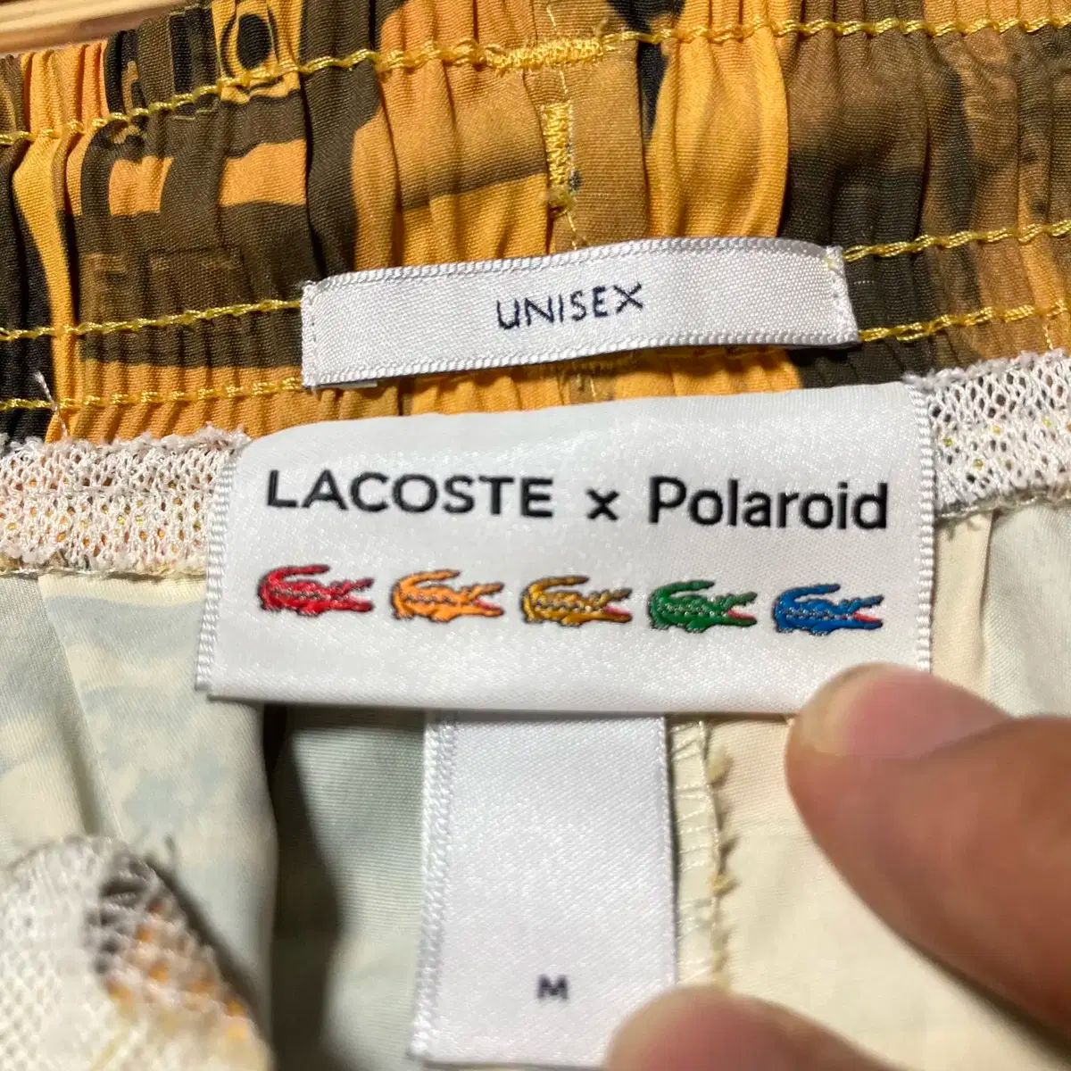 雷市場（ポンジャン）商品韓国直送】 LACOSTE(ラコステ) X ポラロイド 黄色 ハーフ パンツ - メルカリ