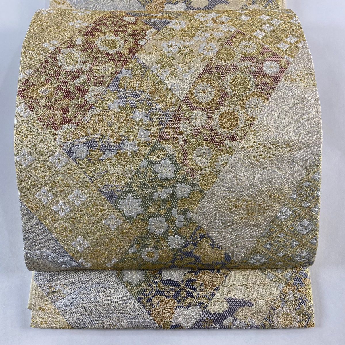 袋帯 秀品 草花 波 金糸 箔 クリーム 六通 正絹