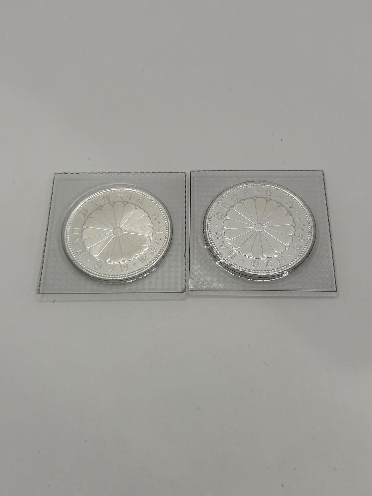 昭和天皇陛下御在位60年記念1万円銀貨ブリスターパック2枚セット WWW_IBETON_RU