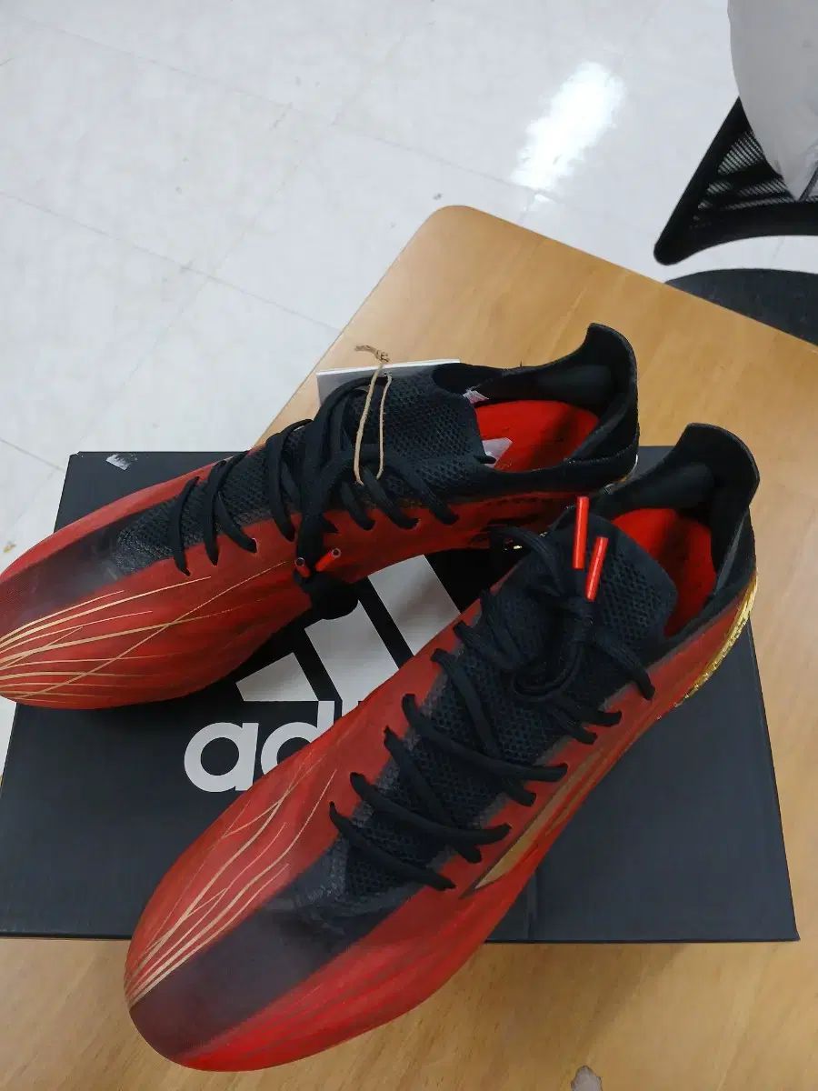 アディダス エックススピードポータル.1SG(オレンジ×ブラック