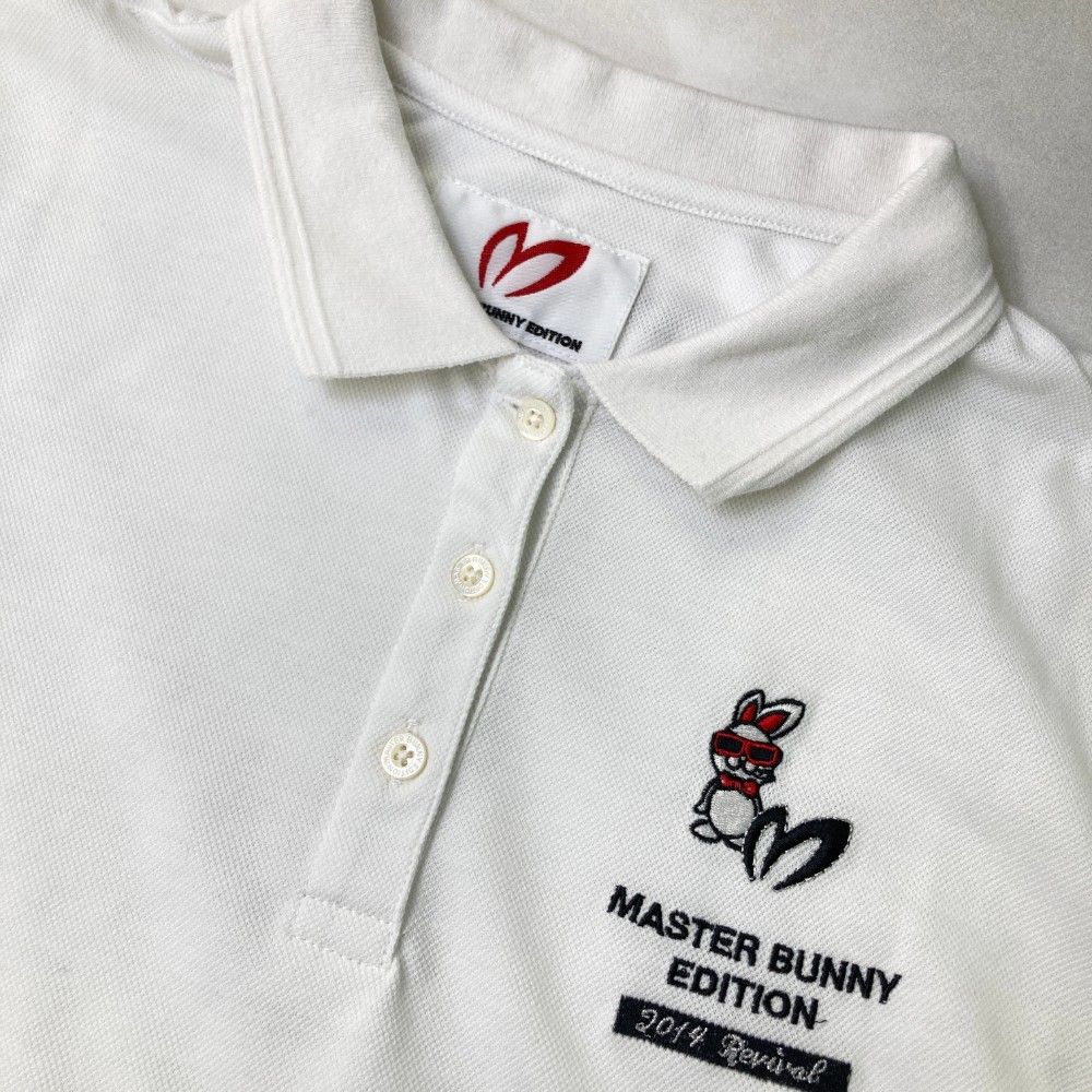 サイズ：2 MASTER BUNNY EDITION マスターバニーエディション 2024年モデル 半袖ポロシャツ SWAGGY BUNNY  ホワイト系 [240101429426] ゴルフウェア レディース ストスト サイズ：2 MASTER BUNNY EDITION マスターバニーエディション