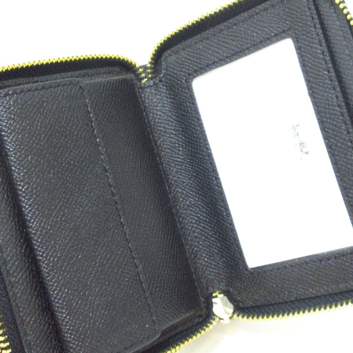 COACH(コーチ) / 2つ折り財布/PVC/ベージュ/シグネチャー
