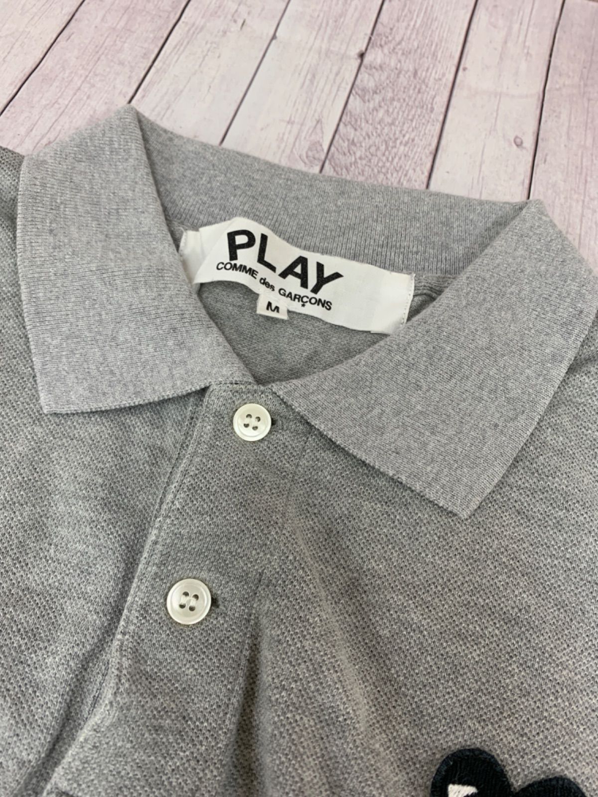 コムデギャルソン　ポロシャツ PLAY COMME des GARCONS(プレイコムデギャルソン) ポロシャツ AX