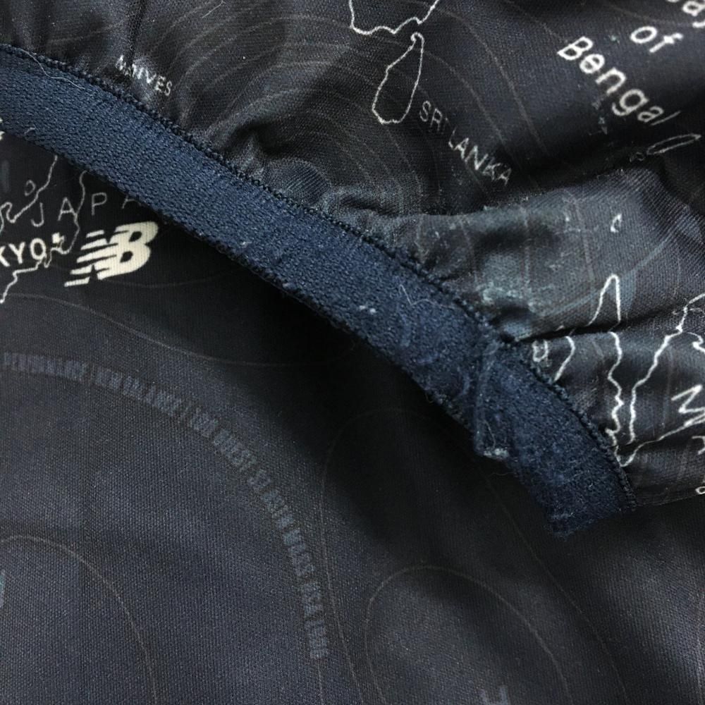 美品】ニューバランスゴルフ 2WAY中綿スニード ネイビー×白 世界地図柄