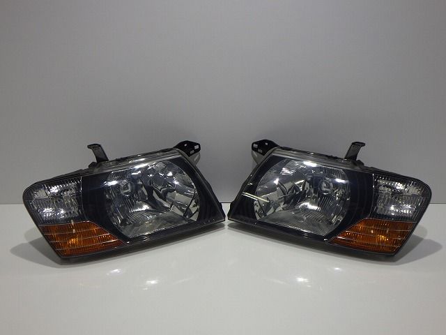 コーティング加工済 ミツビシ V73W V75W パジェロ ヘッドライト左右 ハロゲン 100-87419 A 250515046