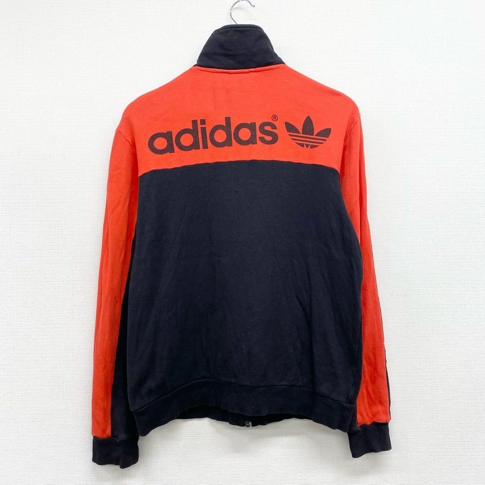 アディダストリコロールトラックトップスリーストライプトレフォイル