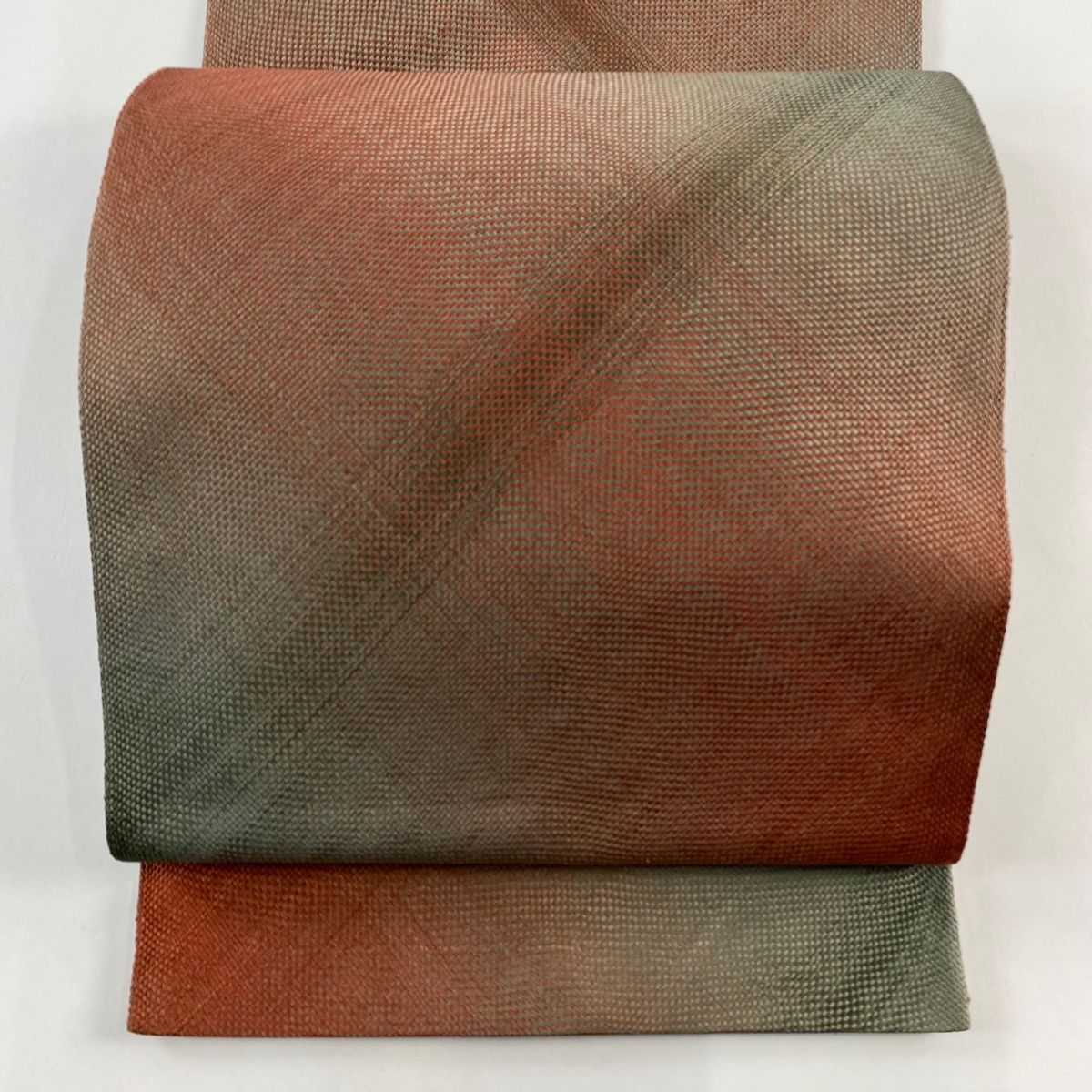 袋名古屋帯 秀品 幾何学模様 茜色 正絹