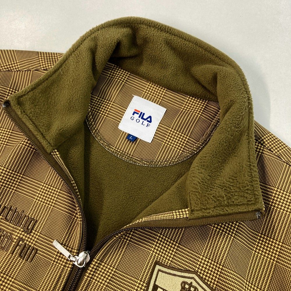 サイズ：L FILA GOLF フィラゴルフ  裏起毛 ジップジャケット チェック柄 ブラウン系 [240101428070] ゴルフウェア メンズ ストスト FILA GOLF フィラゴルフ 裏起毛 ジップジャケット チェック柄
