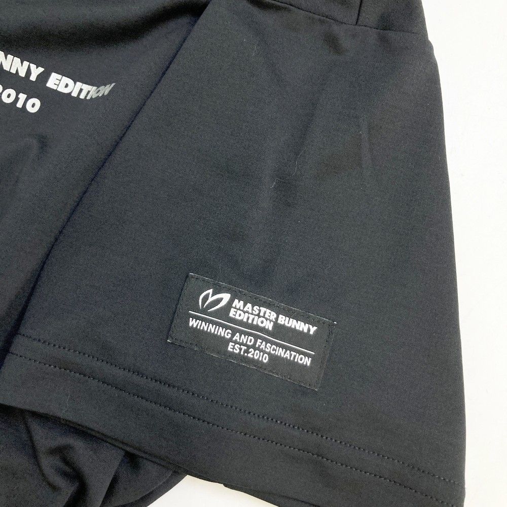 サイズ：4 MASTER BUNNY EDITION マスターバニーエディション  半袖ハイネックTシャツ  ブラック系 [240101447438] ゴルフウェア メンズ ストスト サイズ：4 MASTER BUNNY EDITION マスターバニーエディション