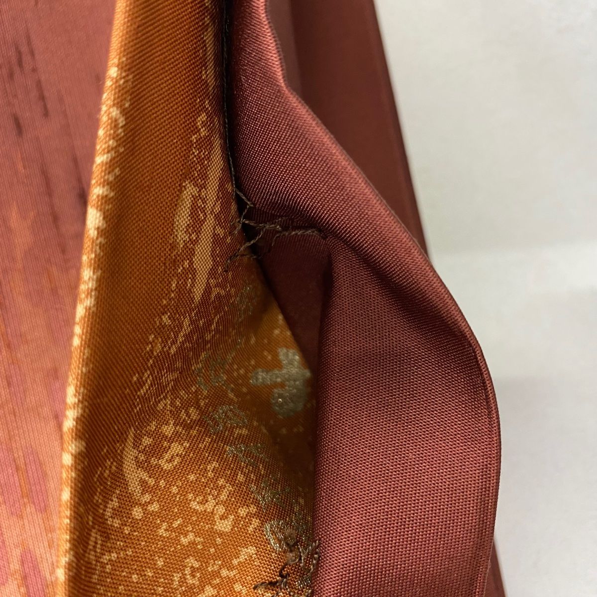 袋帯 美品 逸品 落款 牛首紬地 霞 ぼかし えんじ色 お太鼓柄