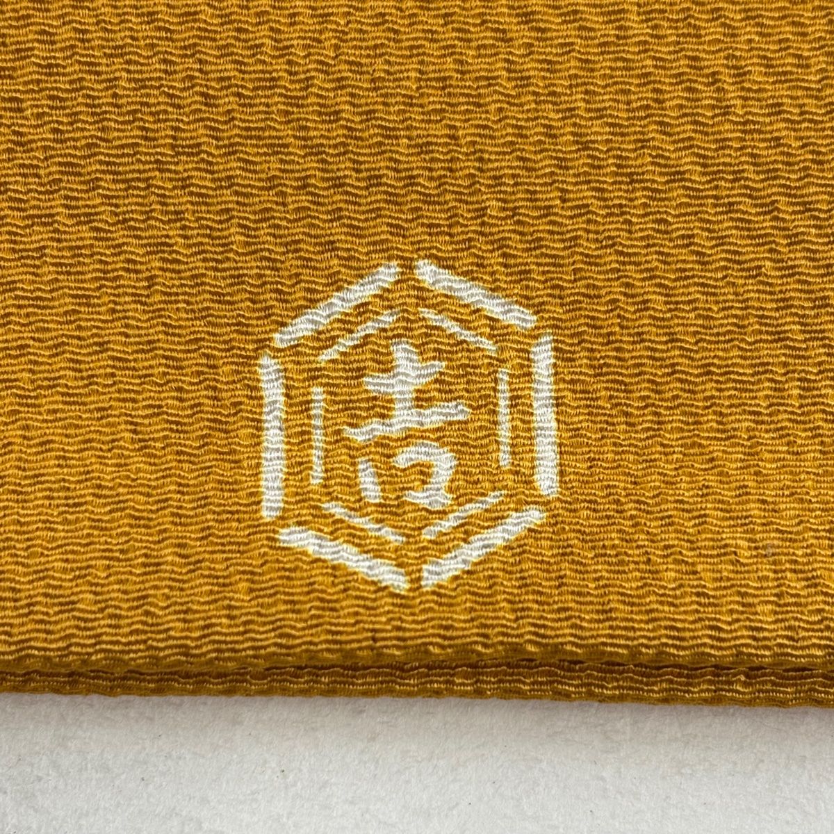 開き名古屋帯 美品 名品 栗山吉三郎 落款 椿 縮緬 山吹色 正絹