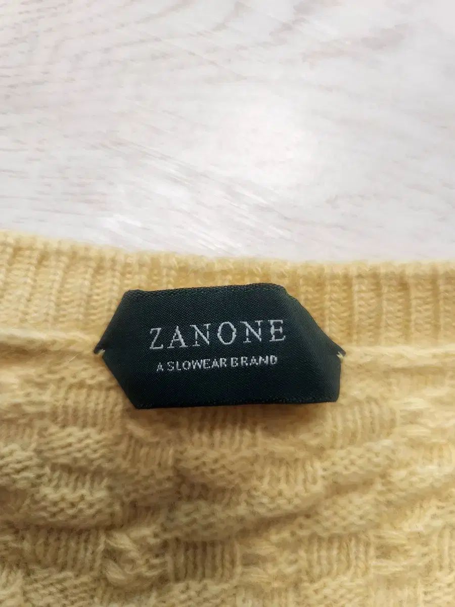 ZANONE のイェローニット サイズ50 実際100程度