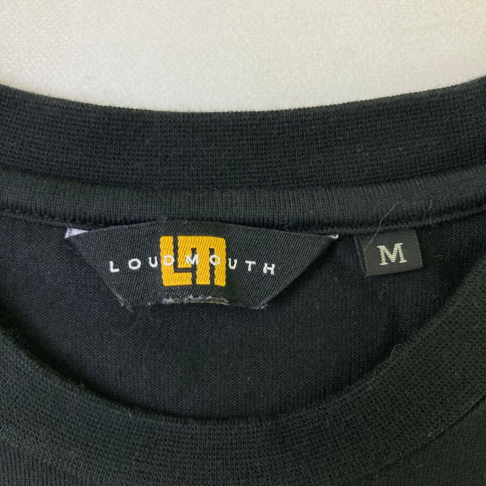 サイズ：M LOUD MOUTH ラウドマウス  半袖Tシャツ シャガデリック 総柄 ブラック系 [240101430024] ゴルフウェア メンズ ストスト tシャツ LOUDMOUTH/ラウドマウス ゴルフウェア ブランド ロゴ
