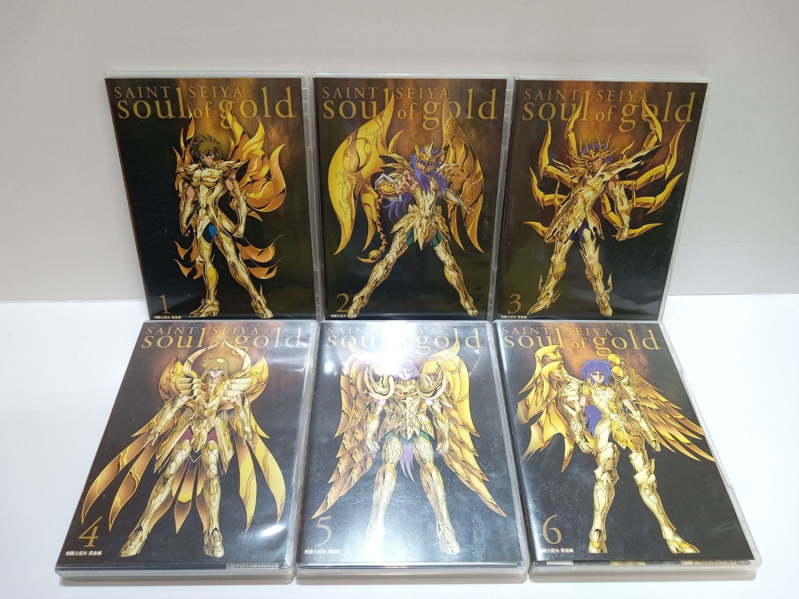 聖闘士星矢 黄金魂 DVD全巻セット おまけ2冊 聖闘士星矢 黄金魂 全6巻セット DVD [28DD0728-006] 【公式通販】