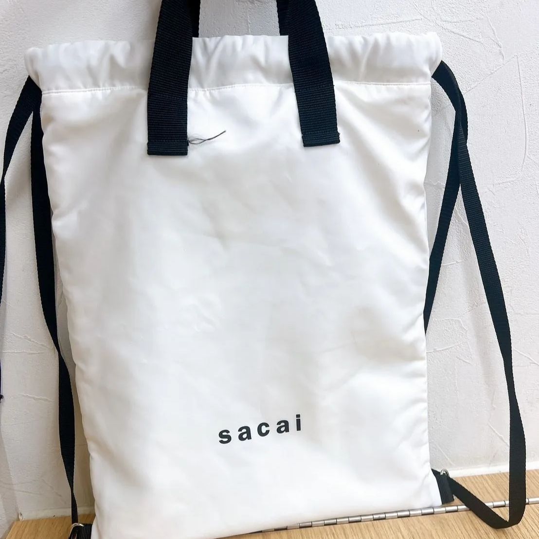 sacai トートバッグ ナップザック 巾着 ホワイト AID240591449