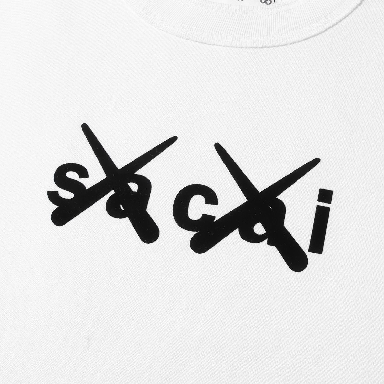 Sacai サカイ Tシャツ サイズ:3 21AW KAWS カウズ フロッキーロゴ 