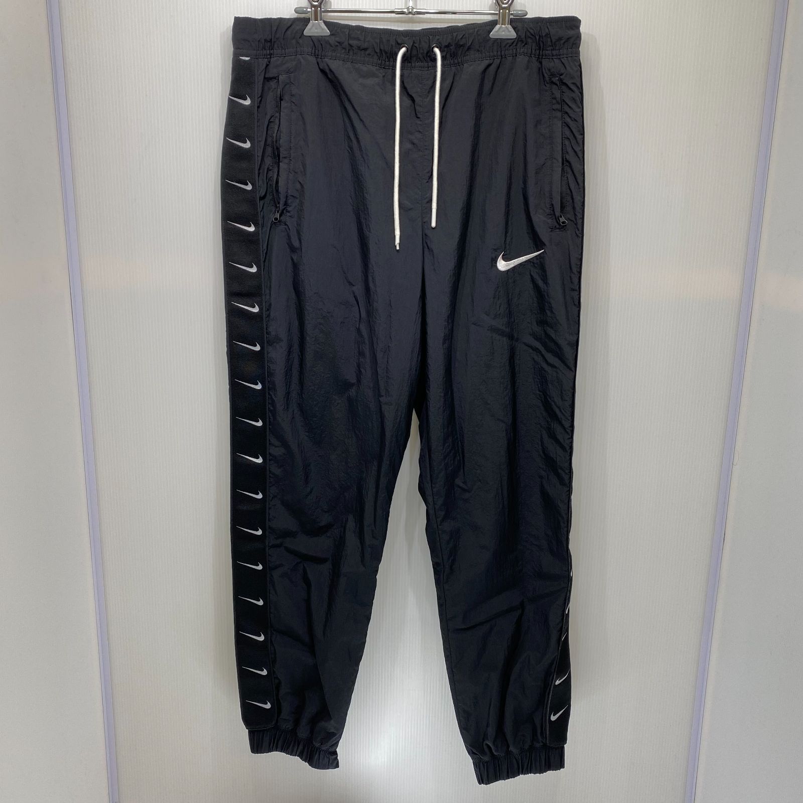 NIKE スウッシュ ウーブンパンツ CD0422-010 ブラック - メルカリ