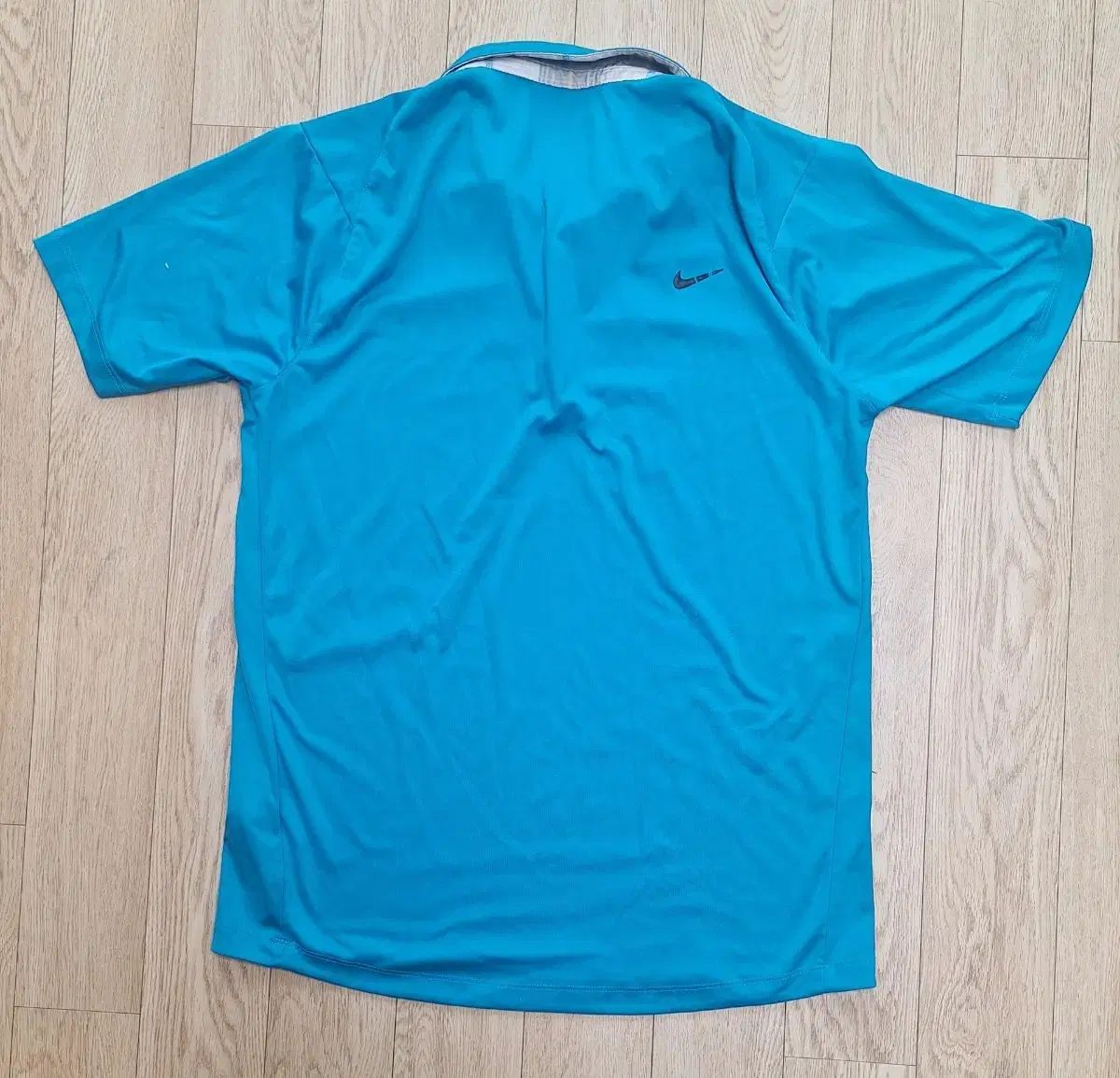未使用 NIKE(ナイキ) ゴルフ 青 半袖Tシャツ 90 サイズ (巻尺の写真 
