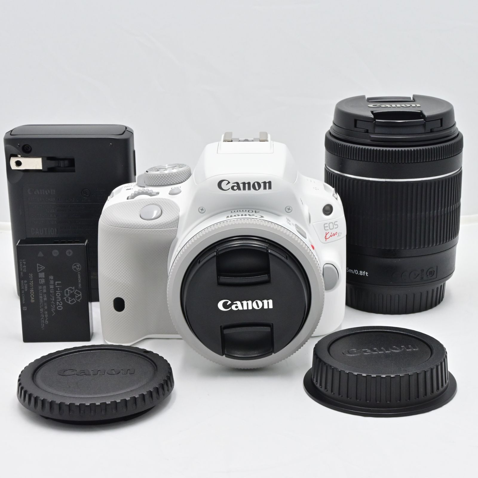 シャッター回数『2030』Canon デジタル一眼レフカメラ EOS Kiss X7(ホワイト) ダブルレンズキット EF-40mm F2.8 STM(ホワイト)  EF-S18-55mm F3.5-5.6 IS STM付属 KISSX7WH-WLK グッチーカメラ メルカリ