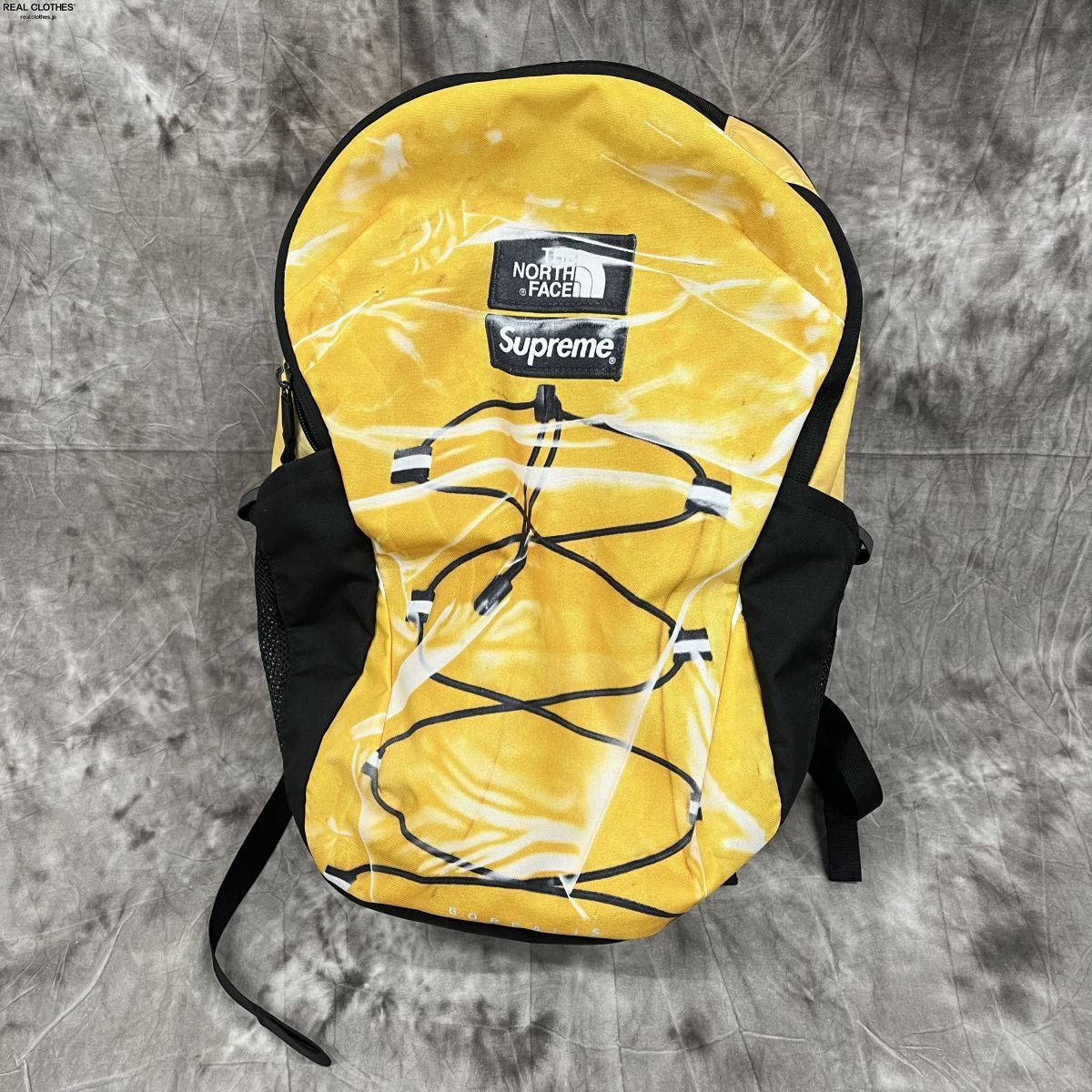 Yellow north face discount backpack