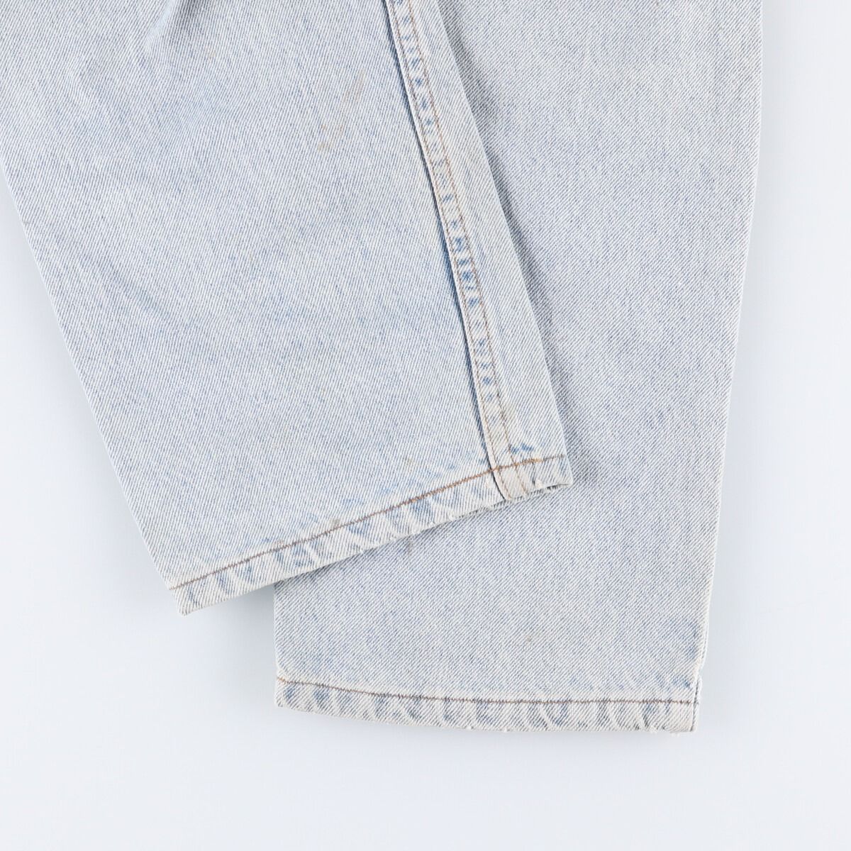 オレンジタブ テーパードデニムパンツ