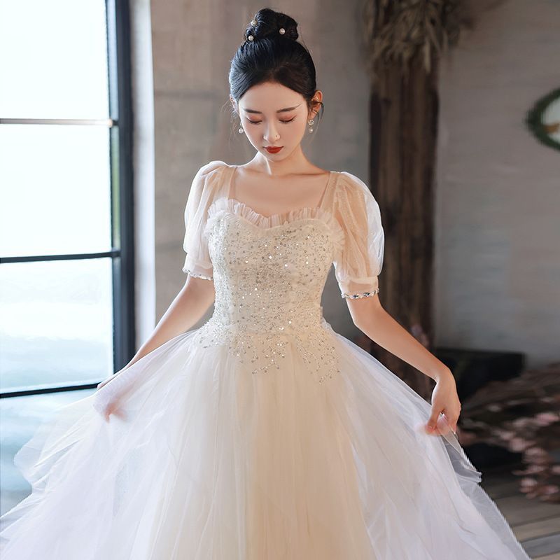 送料無用 レディースドレス 2025夏 フランス風 ライトシャンパン 結婚式 証明写真 デート向け 軽やかワンピース